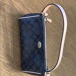 Small purse.  Approximate size-10” x 5 1/2.